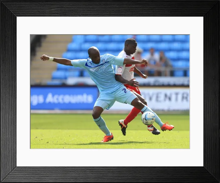 Framed Print : Battle for the Ball: Coventry City vs. Stevenage in Npower League One - Edjenguele vs. Akins