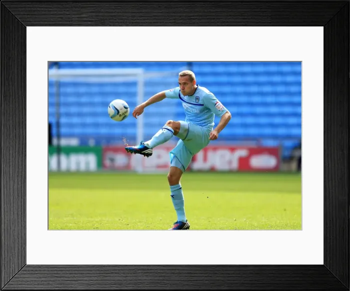 Framed Print : Coventry City vs Stevenage: Npower League One Showdown at Ricoh Arena - Chris Hussey in Action