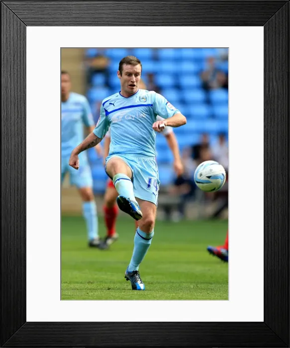 Framed Print : Stephen Elliott and Coventry City Take On Stevenage in Npower League One Clash at Ricoh Arena