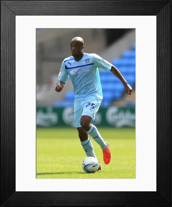 Framed Print : William Edjenguele in Action: Coventry City vs Stevenage, Npower League One, Ricoh Arena (2012) Framed Print : William Edjenguele in Action: Coventry City vs Stevenage, Npower League One, Ricoh Arena (2012)
