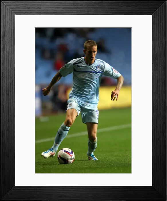 Framed Print : Carl Baker Fights for Coventry City in Intense Capital One Cup Clash vs. Birmingham City at Ricoh Arena Framed Print : Carl Baker Fights for Coventry City in Intense Capital One Cup Clash vs. Birmingham City at Ricoh Arena
