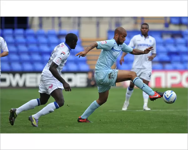 David McGoldrick vs Zoumana Bakayogo: Intense Face-Off in Coventry City's Npower League One Clash at Prenton Park