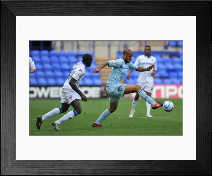 Framed Print : David McGoldrick vs Zoumana Bakayogo: Intense Face-Off in Coventry City's Npower League One Clash at Prenton Park Framed Print : David McGoldrick vs Zoumana Bakayogo: Intense Face-Off in Coventry City's Npower League One Clash at Prenton Park