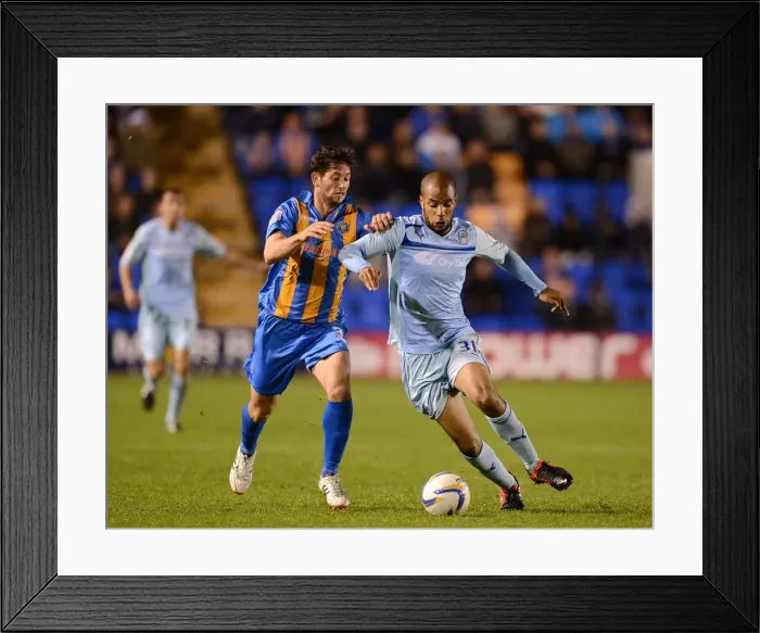 Framed Print : Intense Rivalry: McGoldrick vs Jacobson's Battle for Ball in Coventry City's Npower League One Clash (September 18, 2012)