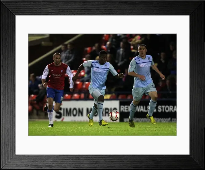 Framed Print : Franck Moussa in Action: Coventry City's Victory in Johnstone's Paint Trophy Northern Section (York City vs Coventry City) Framed Print : Franck Moussa in Action: Coventry City's Victory in Johnstone's Paint Trophy Northern Section (York City vs Coventry City)