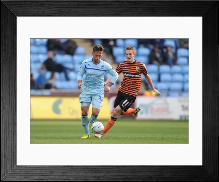 Framed Print : James Bailey Evasive Move Against Jeff Hughes in Coventry City vs Notts County Npower League One Clash at Ricoh Arena