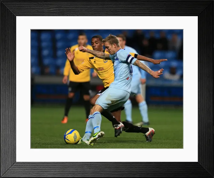 Framed Print : Carl Baker's FA Cup Shot: Coventry City vs Arlesey Town at Ricoh Arena