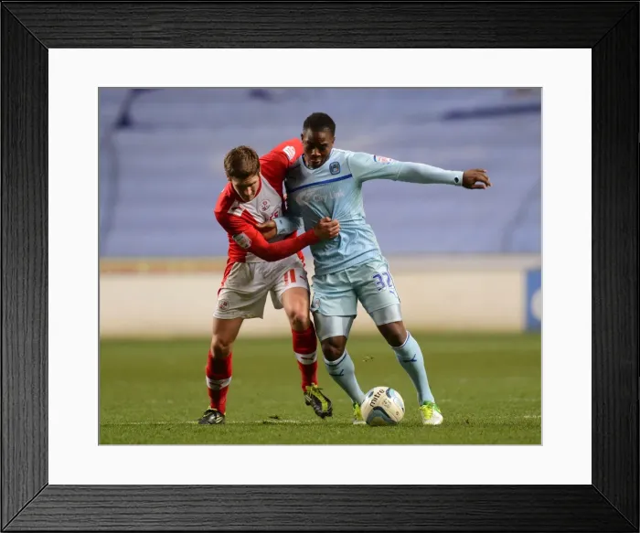 Framed Print : Battle at Ricoh Arena: Franck Moussa vs. Josh Simpson, Coventry City vs. Crawley Town, Npower League One Framed Print : Battle at Ricoh Arena: Franck Moussa vs. Josh Simpson, Coventry City vs. Crawley Town, Npower League One