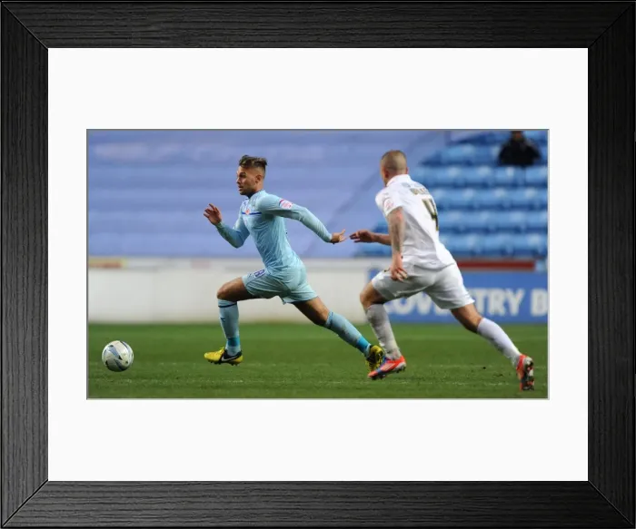 Framed Print : Battling for the Ball: Coventry City vs Scunthorpe United in Football League One at Ricoh Arena