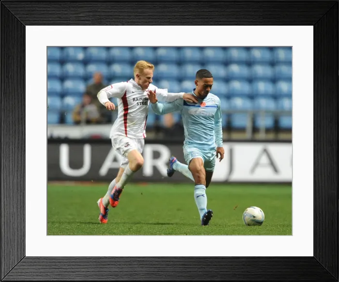 Framed Print : Clash at Ricoh Arena: Jordan Clarke vs Mark Duffy - Coventry City vs Scunthorpe United