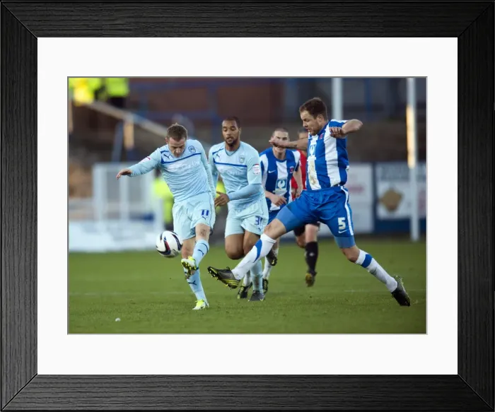 Framed Print : Gary McSheffrey's Tense Shot Under Pressure from Hartlepool United's Sam Collins (Coventry City vs Hartlepool United, Football League One, Victoria Park, 17-11-2012) Framed Print : Gary McSheffrey's Tense Shot Under Pressure from Hartlepool United's Sam Collins (Coventry City vs Hartlepool United, Football League One, Victoria Park, 17-11-2012)