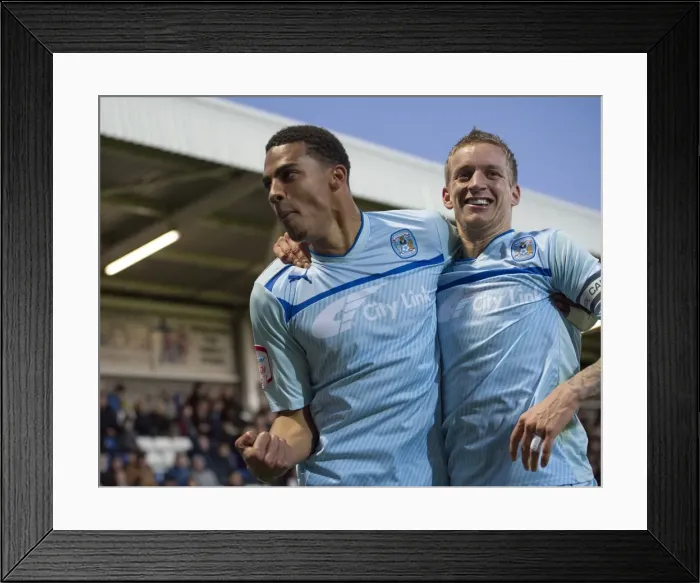 Framed Print : Coventry City's Glory: Franck Moussa and Carl Baker's Euphoric Celebration after Scoring the Third Goal vs Hartlepool United in Football League One Framed Print : Coventry City's Glory: Franck Moussa and Carl Baker's Euphoric Celebration after Scoring the Third Goal vs Hartlepool United in Football League One