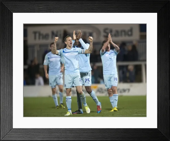 Framed Print : Carl Baker's Euphoric Moment: Coventry City's Promotion Celebration vs Hartlepool United