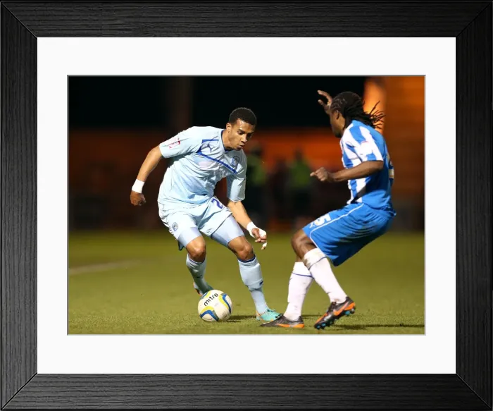 Framed Print : Battle for the Ball: Coventry City vs. Colchester United - Npower Football League One Framed Print : Battle for the Ball: Coventry City vs. Colchester United - Npower Football League One