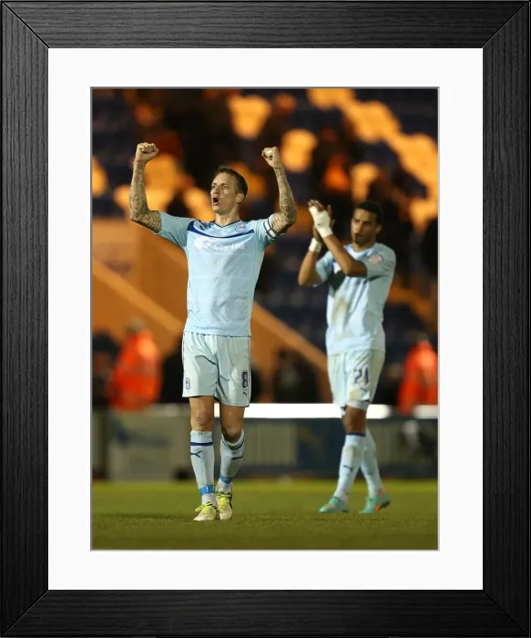 Framed Print : Coventry City FC: Celebrating Promotion - Baker and Christie's Triumphant Moment after Winning against Colchester United in Npower League One
