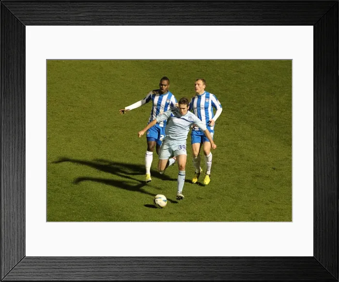 Framed Print : Blair Adams Escape: Coventry City vs Colchester United in Npower League One