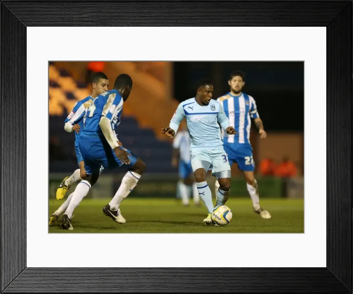Framed Print : Franck Moussa in Action: Coventry City vs Colchester United, Npower League One, Weston Homes Community Stadium (2011-2012) Framed Print : Franck Moussa in Action: Coventry City vs Colchester United, Npower League One, Weston Homes Community Stadium (2011-2012)