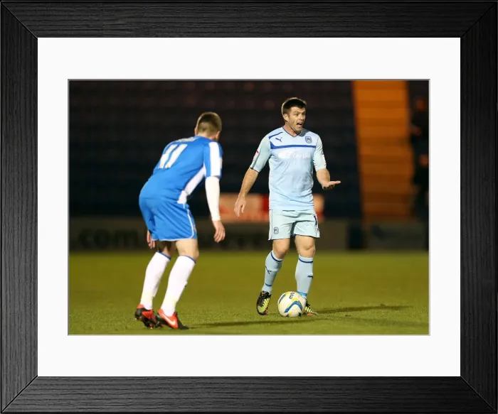 Framed Print : Intense Rivalry: Jennings vs. Sears in Coventry City's Npower League One Showdown against Colchester United Framed Print : Intense Rivalry: Jennings vs. Sears in Coventry City's Npower League One Showdown against Colchester United