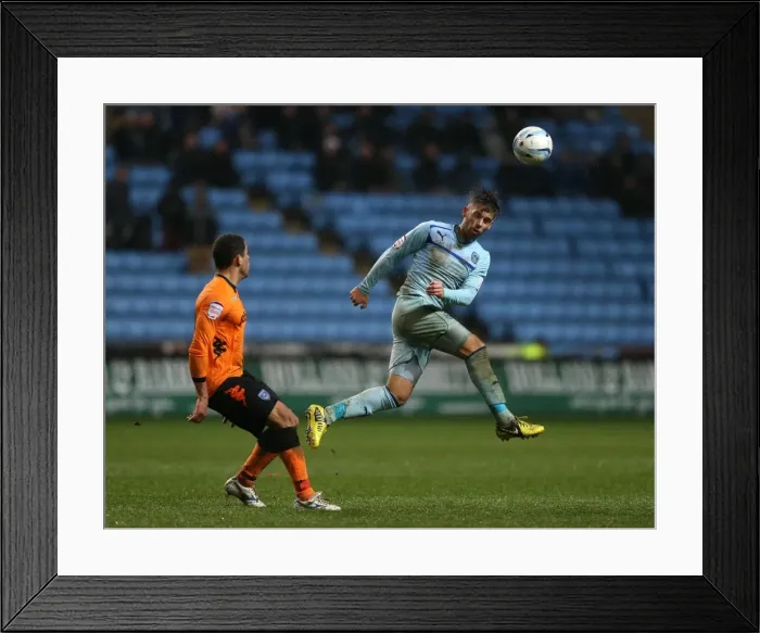 Framed Print : Coventry City vs Portsmouth: James Bailey vs Darel Russell - Npower League One Rivalry at Ricoh Arena