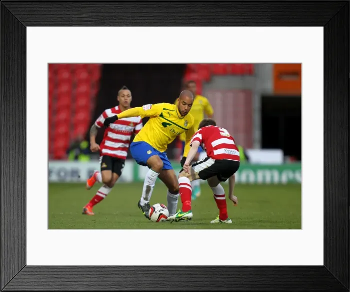 Framed Print : David McGoldrick Charges Past James Husband: Coventry City vs Doncaster Rovers in Npower League One Framed Print : David McGoldrick Charges Past James Husband: Coventry City vs Doncaster Rovers in Npower League One