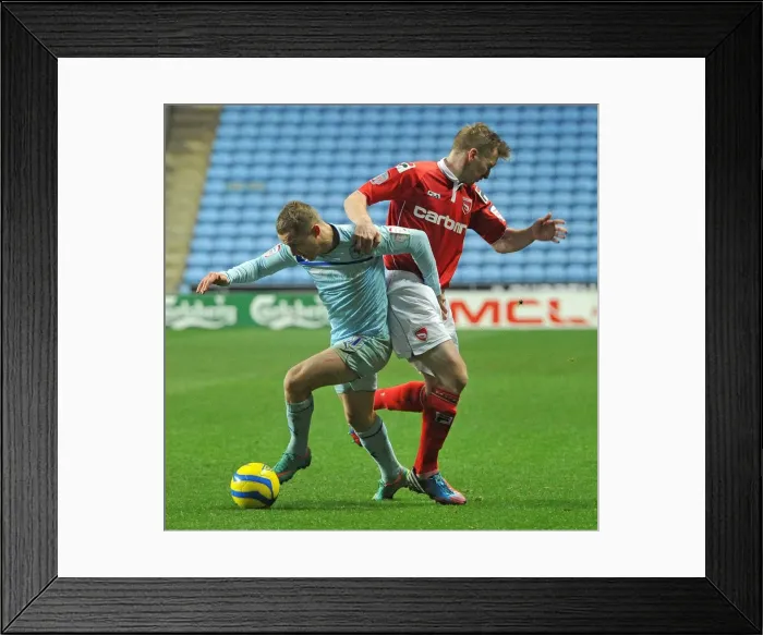 Framed Print : Gary McSheffrey vs. Andrew Wright: FA Cup Battle at Ricoh Arena - Coventry City vs. Morecambe Framed Print : Gary McSheffrey vs. Andrew Wright: FA Cup Battle at Ricoh Arena - Coventry City vs. Morecambe