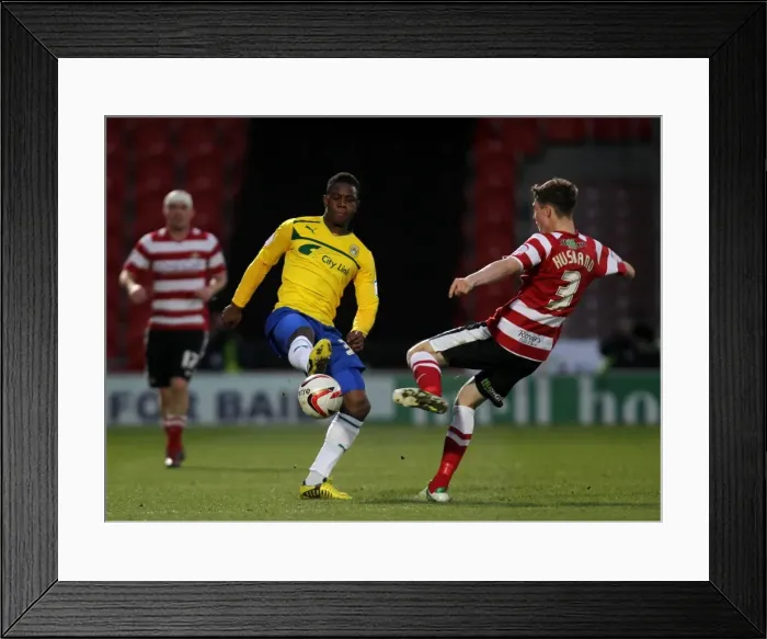Framed Print : Franck Moussa Outmuscles James Husband: Coventry City's Edge over Doncaster Rovers in npower Football League One Framed Print : Franck Moussa Outmuscles James Husband: Coventry City's Edge over Doncaster Rovers in npower Football League One