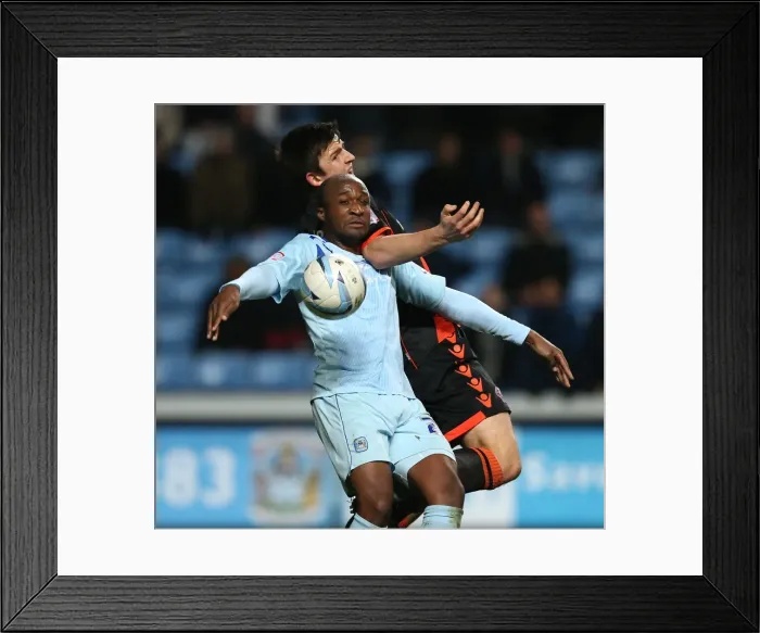 Framed Print : Johnstones Paint Trophy Quarter-Final: Coventry City vs Sheffield United Showdown at Ricoh Arena - Clash between Edjenguele and Maguire Framed Print : Johnstones Paint Trophy Quarter-Final: Coventry City vs Sheffield United Showdown at Ricoh Arena - Clash between Edjenguele and Maguire