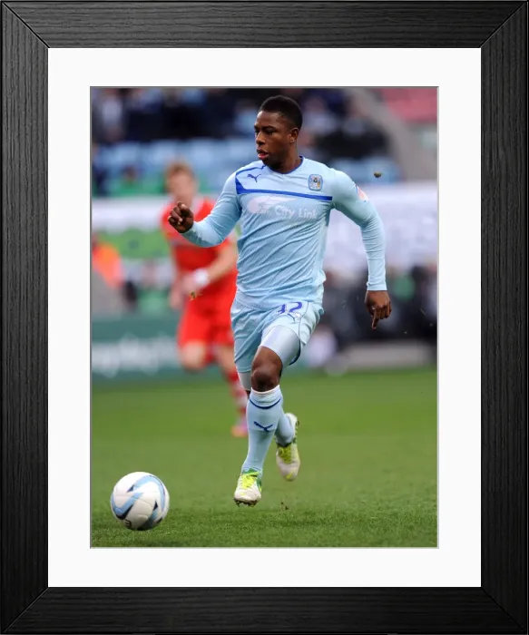 Framed Print : Franck Moussa Scores the Game-winner for Coventry City against Walsall in Npower League One at Ricoh Arena (December 8, 2012) Framed Print : Franck Moussa Scores the Game-winner for Coventry City against Walsall in Npower League One at Ricoh Arena (December 8, 2012)