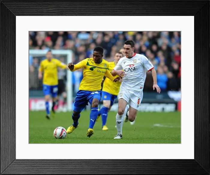 Framed Print : Clash of Midfield Titans: Potter vs. Moussa in Milton Keynes Dons vs. Coventry City (Npower League One, December 29, 2012) Framed Print : Clash of Midfield Titans: Potter vs. Moussa in Milton Keynes Dons vs. Coventry City (Npower League One, December 29, 2012)