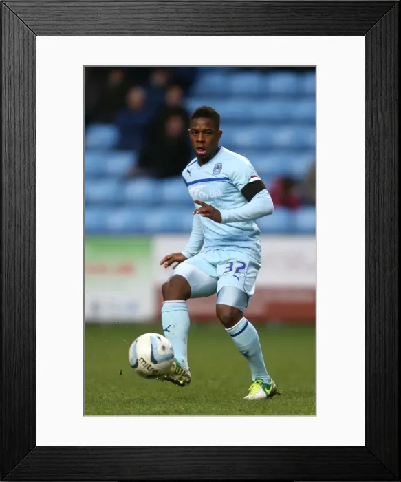 Framed Print : Determined Strike: Coventry City's Franck Moussa Scores Against Shrewsbury Town in Npower League One at Ricoh Arena (2013) Framed Print : Determined Strike: Coventry City's Franck Moussa Scores Against Shrewsbury Town in Npower League One at Ricoh Arena (2013)