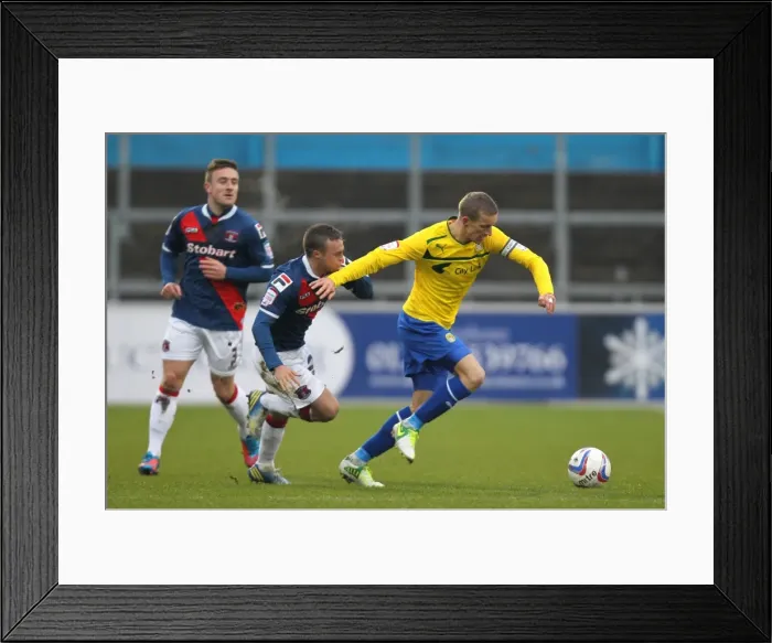 Framed Print : Battling for Control: Chantler vs. Baker in Npower League One Clash Framed Print : Battling for Control: Chantler vs. Baker in Npower League One Clash