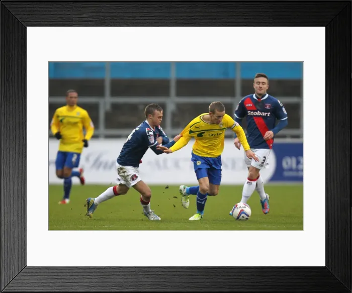 Framed Print : Battling for Supremacy: Chantler vs. Baker in Npower League One Clash Framed Print : Battling for Supremacy: Chantler vs. Baker in Npower League One Clash