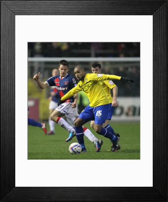 Framed Print : Clarke vs Bennett: A Battle of Willpower in Coventry City's Npower League One Clash against Carlisle United Framed Print : Clarke vs Bennett: A Battle of Willpower in Coventry City's Npower League One Clash against Carlisle United