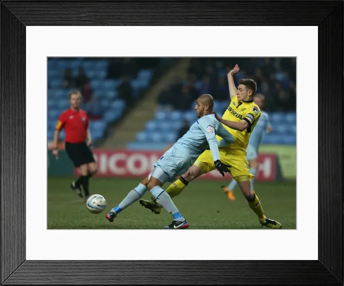 Framed Print : Leon Clarke vs Ash Taylor: Intense Rivalry in Coventry City vs Tranmere Rovers League One Clash (January 16, 2013) Framed Print : Leon Clarke vs Ash Taylor: Intense Rivalry in Coventry City vs Tranmere Rovers League One Clash (January 16, 2013)