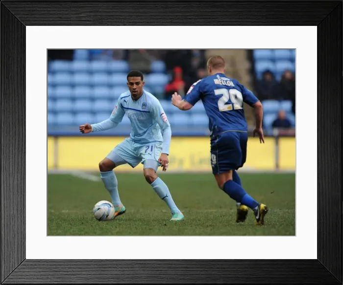 Framed Print : Clash at Ricoh Arena: Cyrus Christie vs. David Mellor - Npower League One Showdown Framed Print : Clash at Ricoh Arena: Cyrus Christie vs. David Mellor - Npower League One Showdown