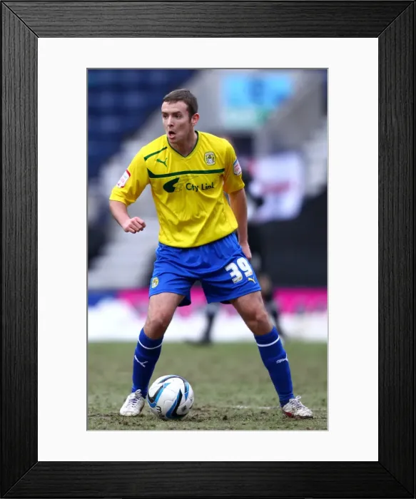 Framed Print : Blair Adams Faces Off in Intense Npower League One Clash Between Coventry City and Preston North End at Deepdale (26-01-2013) Framed Print : Blair Adams Faces Off in Intense Npower League One Clash Between Coventry City and Preston North End at Deepdale (26-01-2013)