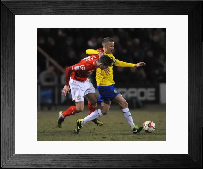 Framed Print : Battle for the Ball: Murphy vs. Baker in the Johnstones Paint Trophy Northern Final Framed Print : Battle for the Ball: Murphy vs. Baker in the Johnstones Paint Trophy Northern Final