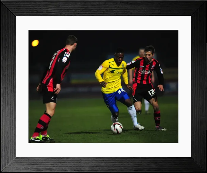 Framed Print : Franck Moussa Evasions: Coventry City's Midfielder Escapes Wes Fogden at AFC Bournemouth Framed Print : Franck Moussa Evasions: Coventry City's Midfielder Escapes Wes Fogden at AFC Bournemouth