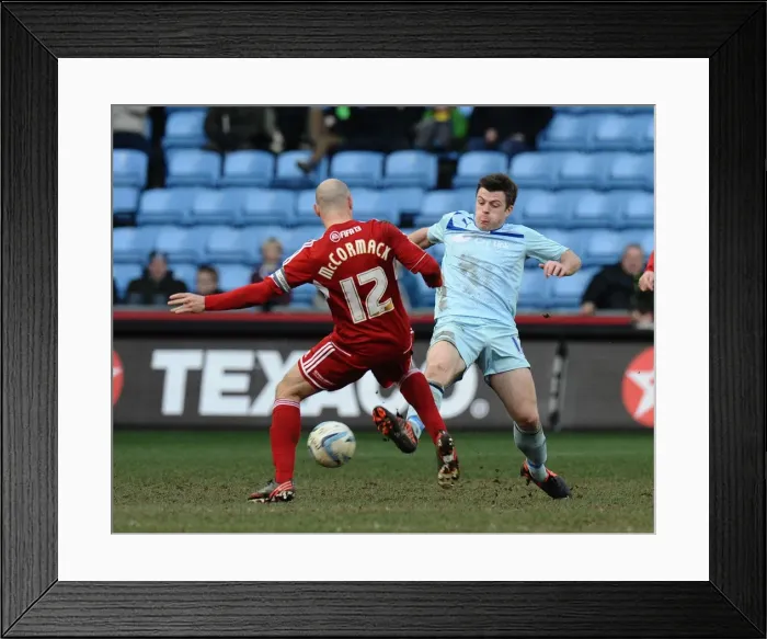 Framed Print : Steven Jennings vs Alan McCormack: Intense Tackle in Coventry City vs Swindon Town Npower League One Match Framed Print : Steven Jennings vs Alan McCormack: Intense Tackle in Coventry City vs Swindon Town Npower League One Match