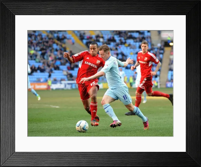 Framed Print : Coventry City vs Swindon Town: Npower League One Clash at Ricoh Arena - Intense Rivalry Framed Print : Coventry City vs Swindon Town: Npower League One Clash at Ricoh Arena - Intense Rivalry