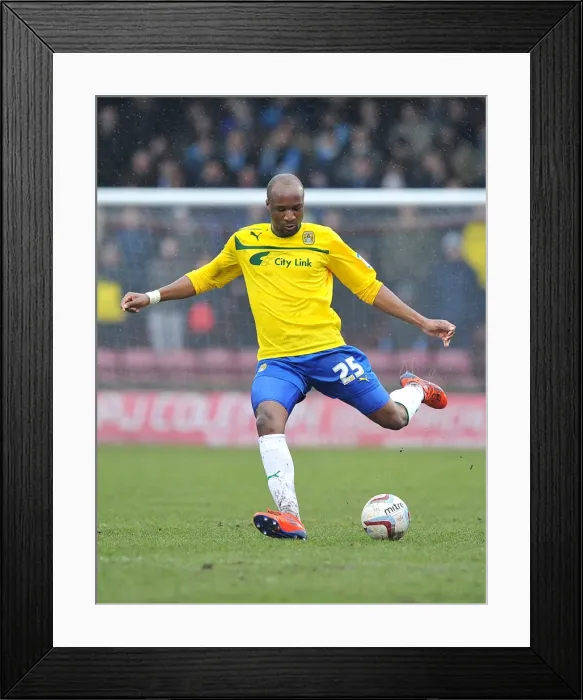Framed Print : Glanford Park Showdown: Coventry City vs Scunthorpe United (William Edjenguele, Npower Football League One - March 9, 2013)