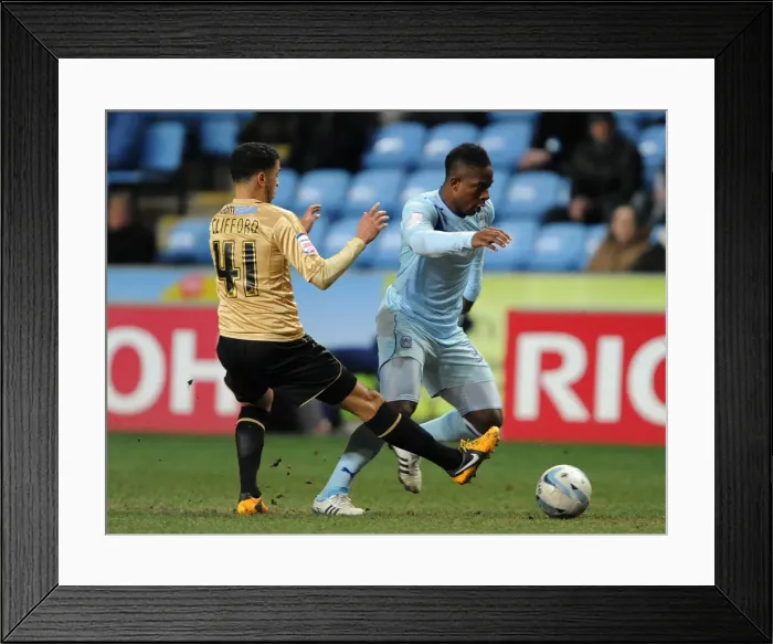 Framed Print : Battle for Supremacy: Coventry City vs. Colchester United in Npower League One Framed Print : Battle for Supremacy: Coventry City vs. Colchester United in Npower League One