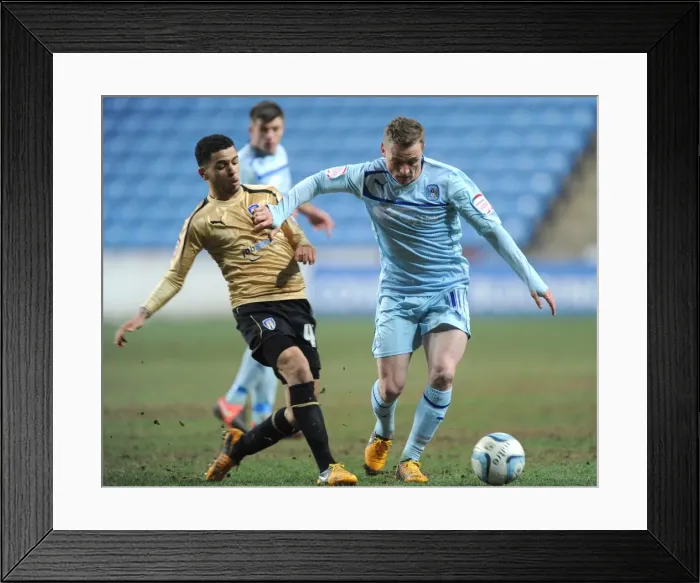 Framed Print : Intense Rivalry: McSheffrey vs Clifford Battle in Coventry City vs Colchester United, Npower League One Framed Print : Intense Rivalry: McSheffrey vs Clifford Battle in Coventry City vs Colchester United, Npower League One