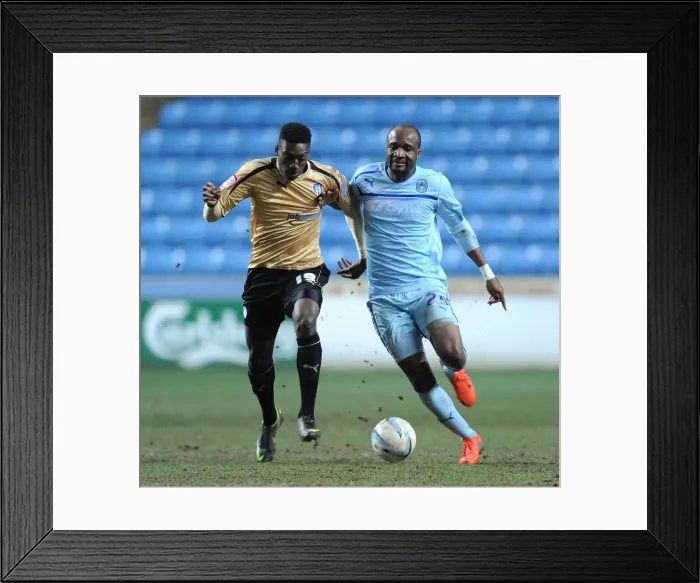 Framed Print : Battle for the Ball: Coventry City vs Colchester United, Npower League One, Ricoh Arena Framed Print : Battle for the Ball: Coventry City vs Colchester United, Npower League One, Ricoh Arena