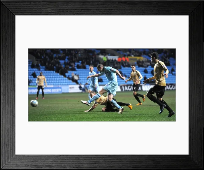 Framed Print : Carl Dickinson's Shot: Coventry City vs Colchester United in Npower League One at Ricoh Arena