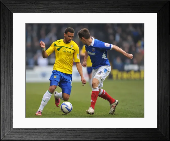 Framed Print : Cooper vs. Christie: A Football League One Battle at Fratton Park