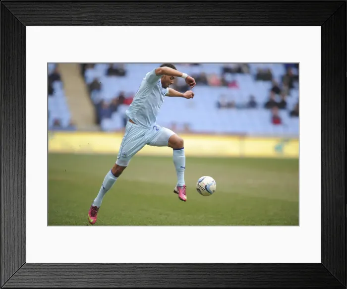 Framed Print : Cyrus Christie in Action: Coventry City vs Doncaster Rovers, Npower League One (March 29, 2013) Framed Print : Cyrus Christie in Action: Coventry City vs Doncaster Rovers, Npower League One (March 29, 2013)