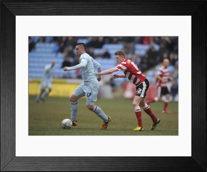 Framed Print : Battle of Ricoh Arena: Coventry City vs Doncaster Rovers in Npower Football League One - Callum Ball vs John Lundstram Framed Print : Battle of Ricoh Arena: Coventry City vs Doncaster Rovers in Npower Football League One - Callum Ball vs John Lundstram