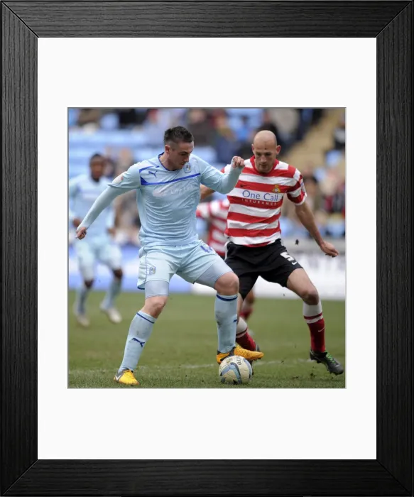 Framed Print : Battle in Football League One: Coventry City vs Doncaster Rovers at Ricoh Arena - Callum Ball vs Rob Jones Framed Print : Battle in Football League One: Coventry City vs Doncaster Rovers at Ricoh Arena - Callum Ball vs Rob Jones
