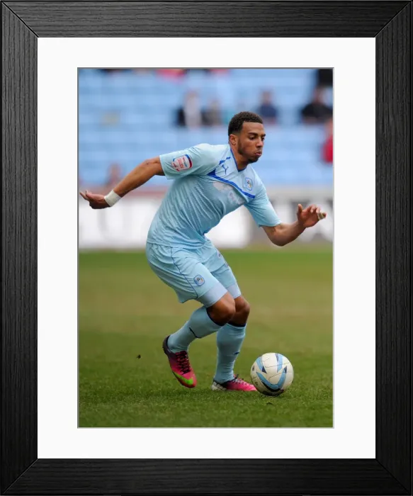 Framed Print : Coventry City's Cyrus Christie in Action Against Doncaster Rovers at Ricoh Arena Framed Print : Coventry City's Cyrus Christie in Action Against Doncaster Rovers at Ricoh Arena